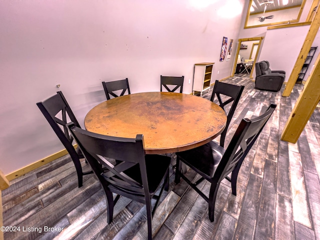 dining area featuring dark hardwood / wood-style flooring