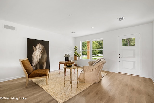 sitting room with light wood-type flooring