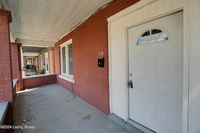 entrance to property with a porch