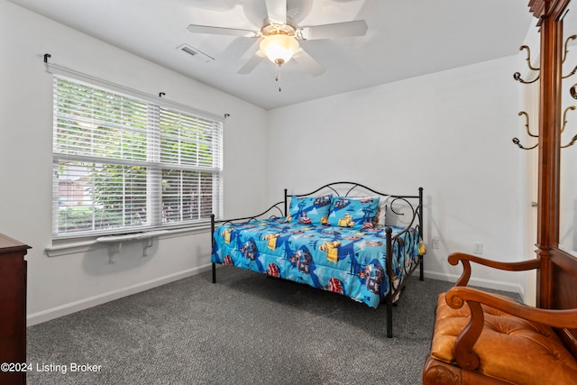 carpeted bedroom featuring ceiling fan