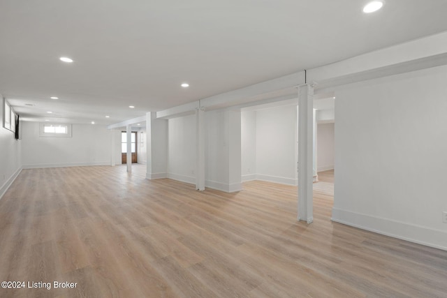 basement featuring light hardwood / wood-style floors