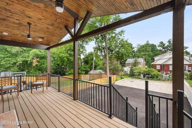 wooden deck with a patio and ceiling fan