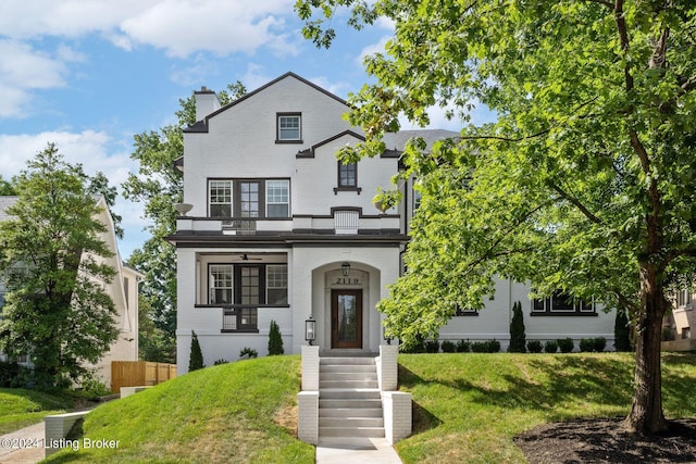 view of front of property with a front lawn