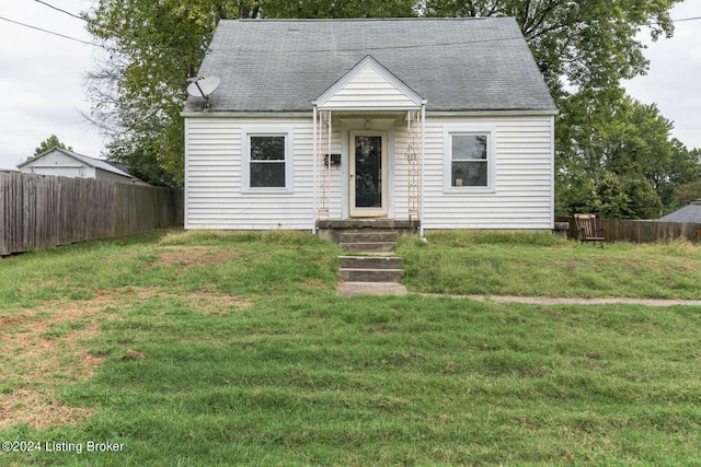 view of front facade featuring a front yard