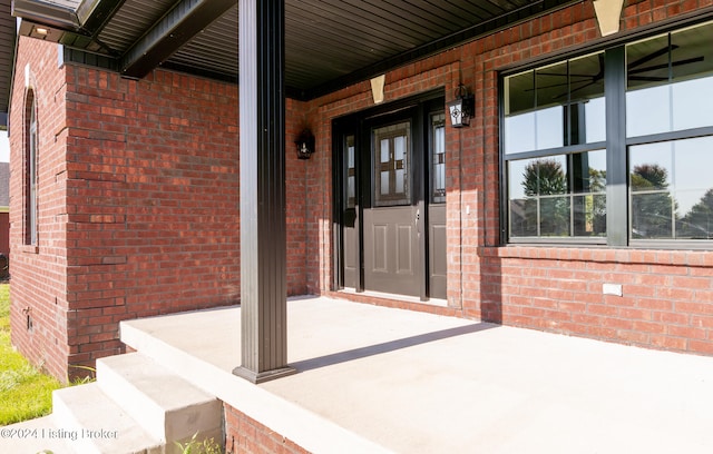 doorway to property featuring a porch