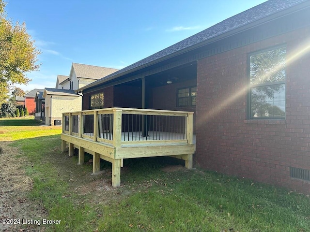 deck featuring a lawn