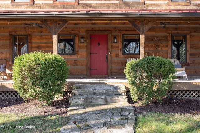 property entrance with covered porch