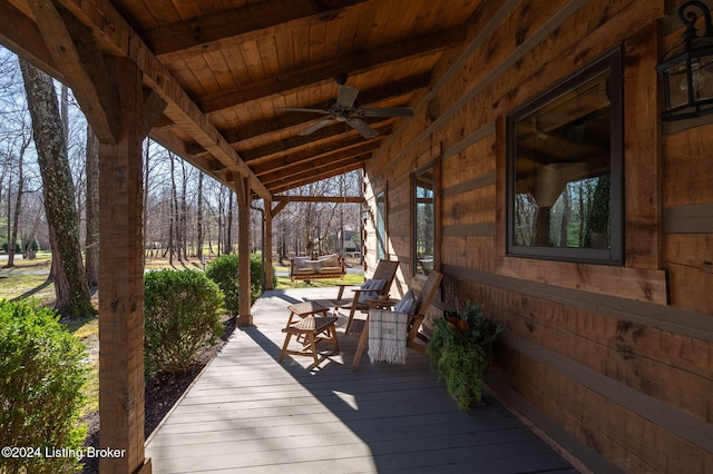 wooden deck with ceiling fan