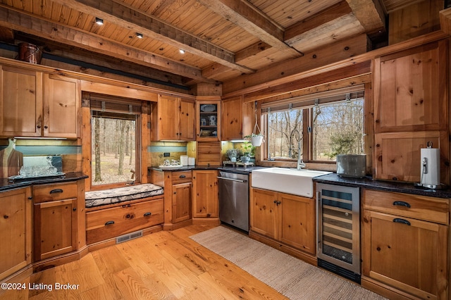 kitchen with wood ceiling, beverage cooler, sink, dishwasher, and light hardwood / wood-style floors