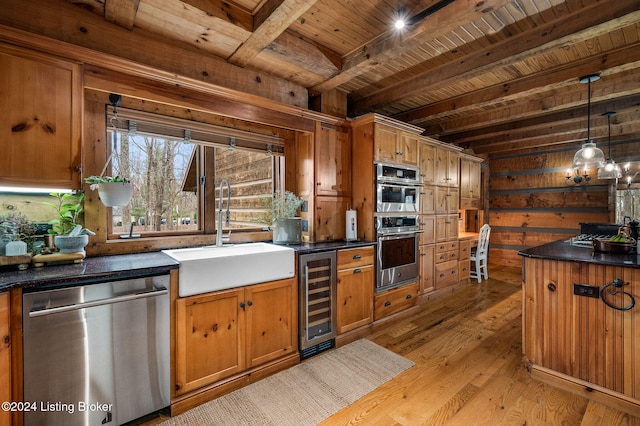 kitchen featuring light wood-type flooring, stainless steel appliances, sink, wooden ceiling, and wine cooler