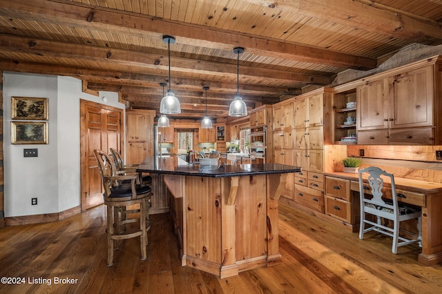 kitchen featuring dark wood-type flooring, beamed ceiling, wooden ceiling, and decorative light fixtures