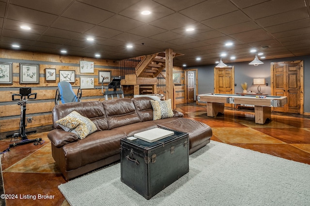 living room featuring tile patterned floors and pool table