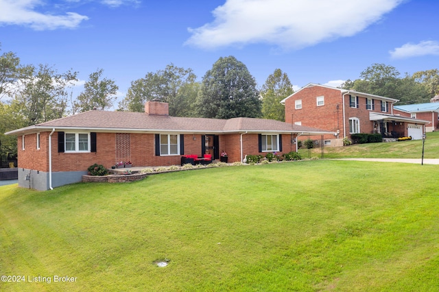 view of front facade with a front lawn