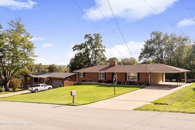 ranch-style home featuring a carport and a front lawn