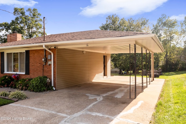 view of car parking with a carport and a yard