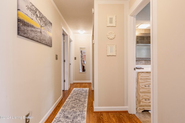 corridor featuring hardwood / wood-style flooring