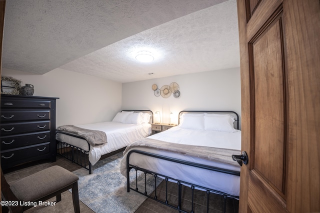 bedroom with a textured ceiling