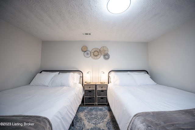 bedroom with a textured ceiling