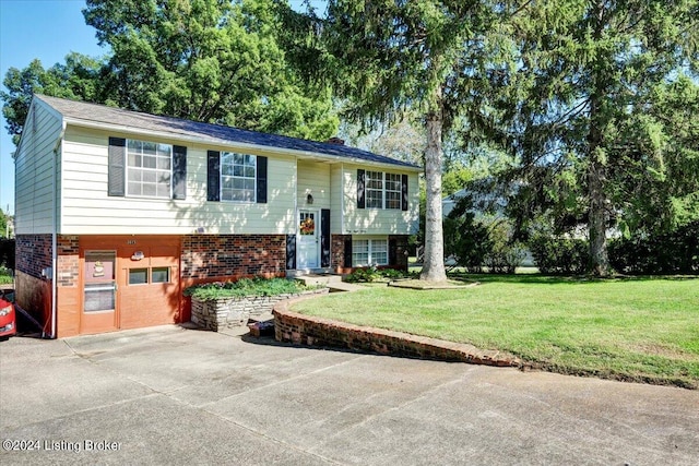 bi-level home with a front lawn