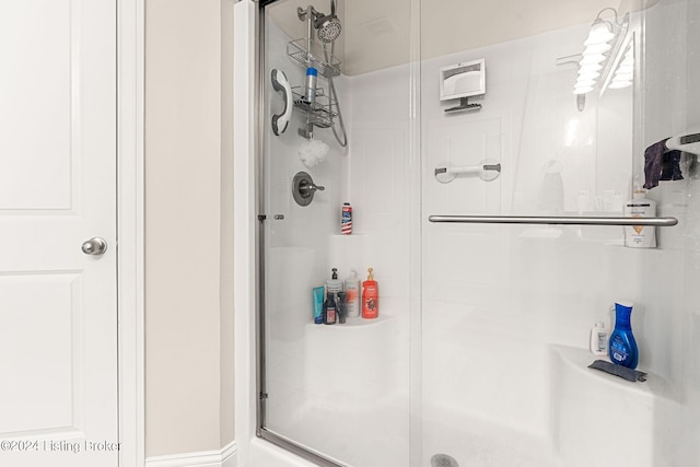 bathroom with an enclosed shower