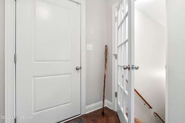 doorway featuring dark hardwood / wood-style flooring