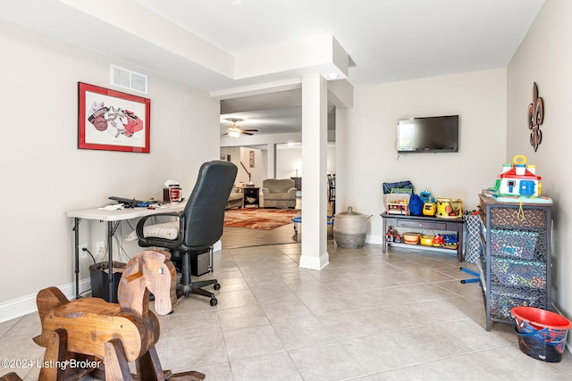 office space with ceiling fan and light tile patterned flooring