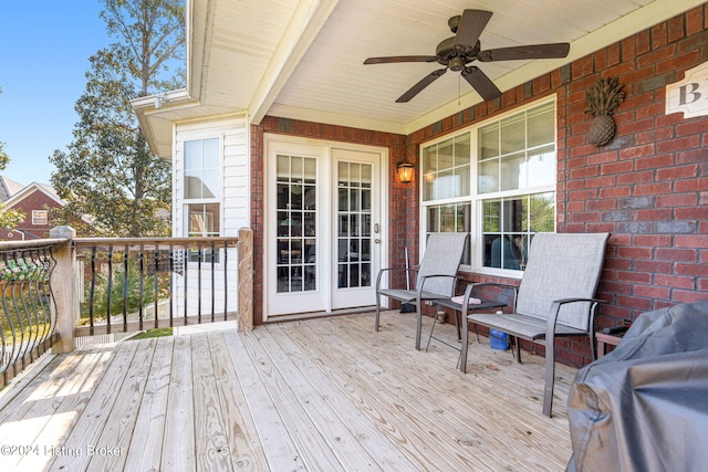 wooden terrace with ceiling fan