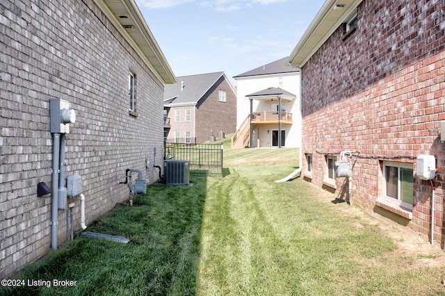 view of yard featuring central AC