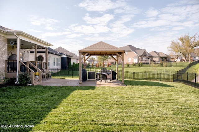 view of yard featuring a gazebo and a patio