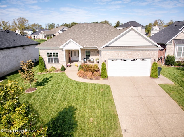 ranch-style house with a front yard and a garage