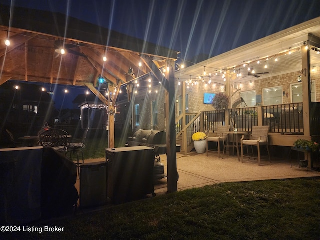 view of patio at twilight