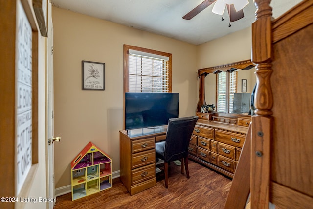 home office featuring ceiling fan and dark hardwood / wood-style floors