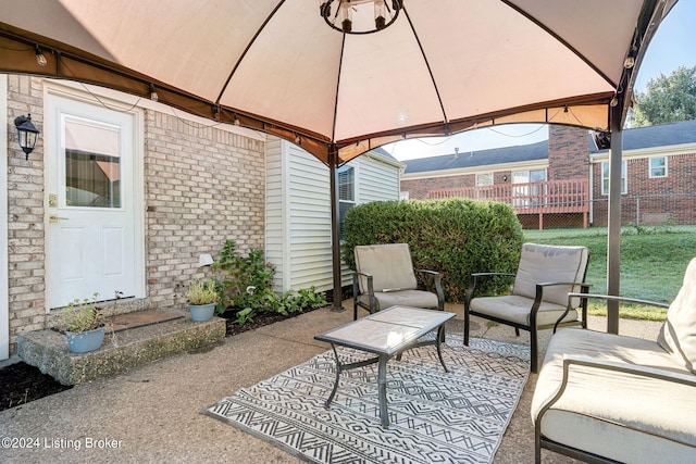 view of patio featuring a gazebo