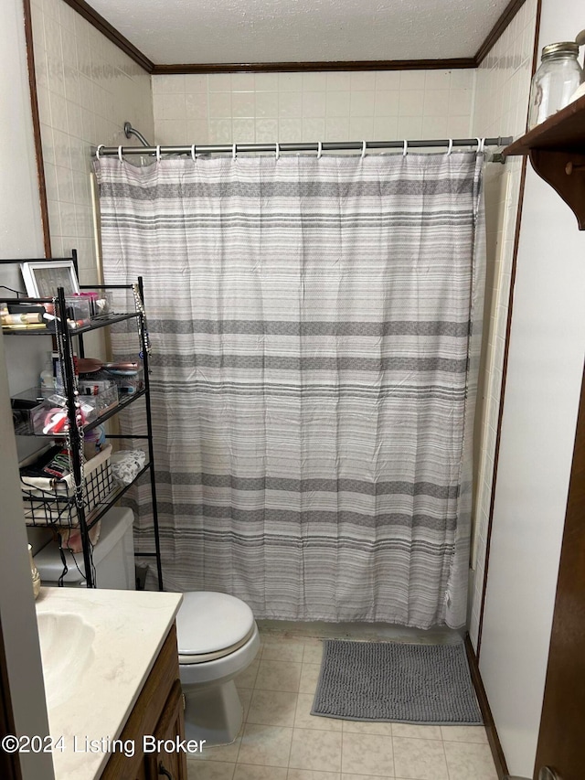 bathroom featuring tile patterned floors, ornamental molding, a shower with curtain, vanity, and toilet