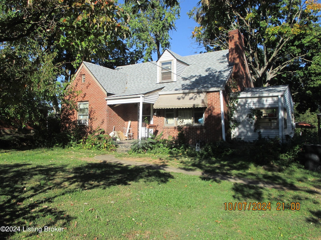 exterior space featuring a front lawn