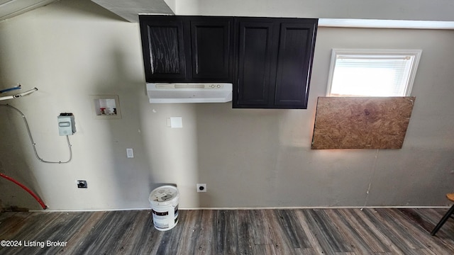 laundry room with hookup for a washing machine, cabinets, hookup for an electric dryer, and dark hardwood / wood-style flooring