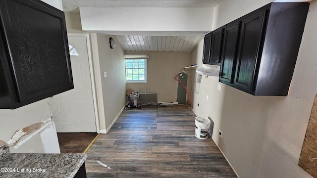 washroom with dark hardwood / wood-style flooring