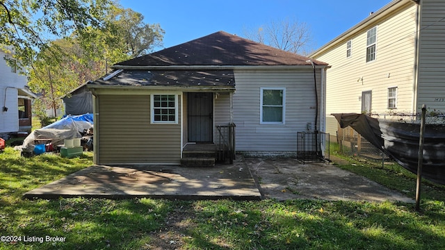 rear view of house with a patio