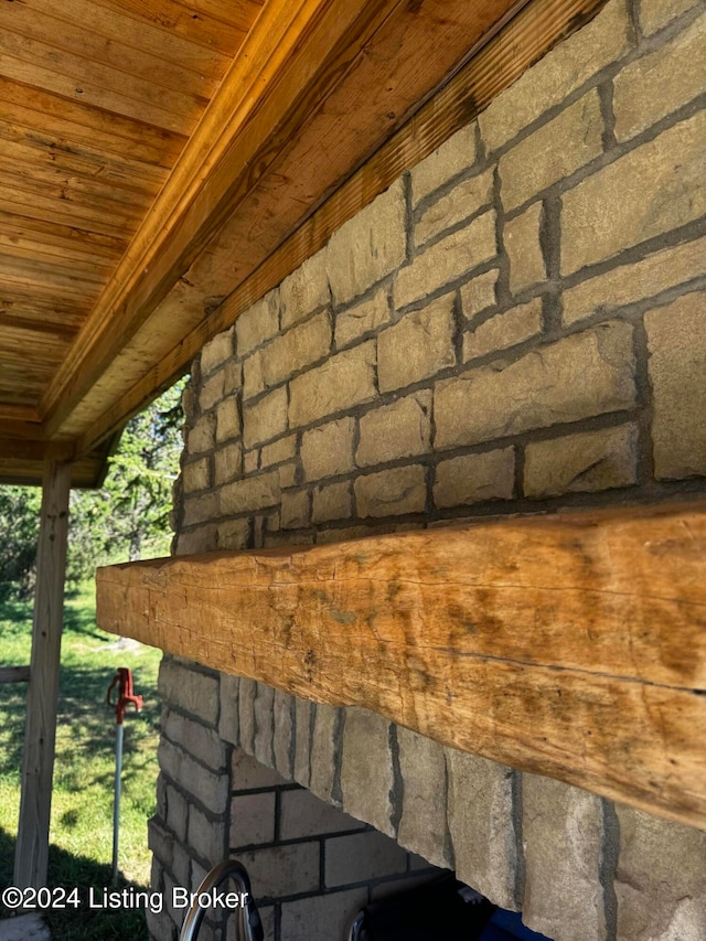 exterior details featuring wood ceiling