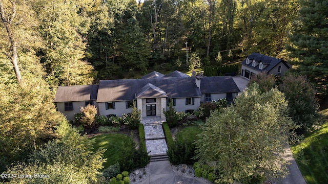 aerial view featuring a view of trees