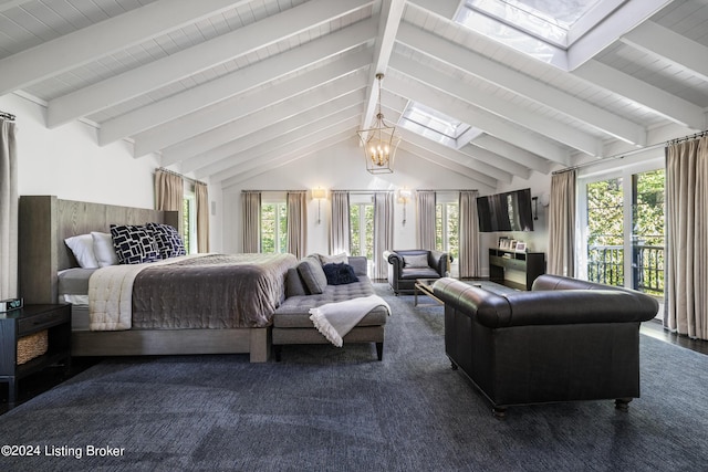 carpeted bedroom featuring a chandelier, vaulted ceiling with skylight, and access to outside