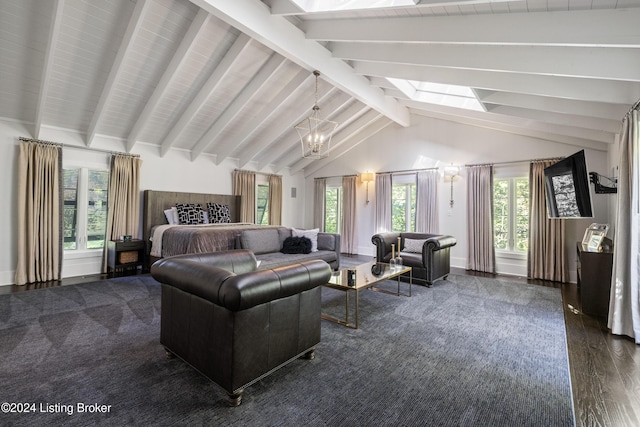 living area with a chandelier, dark wood-type flooring, and lofted ceiling with skylight