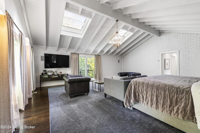 bedroom featuring brick wall, vaulted ceiling with skylight, and dark wood-style floors