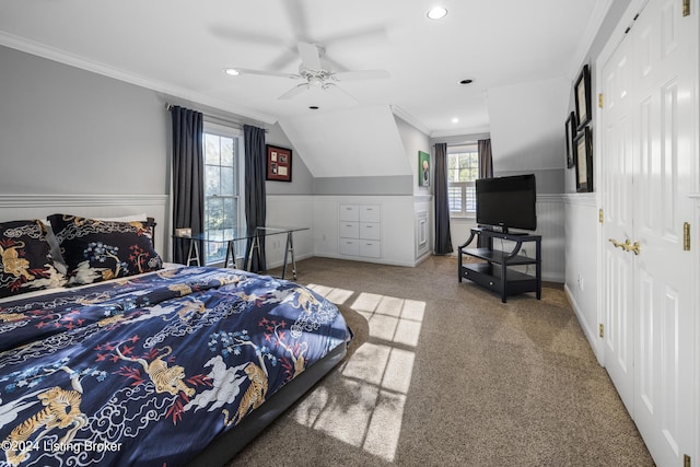 bedroom with ornamental molding, lofted ceiling, wainscoting, and recessed lighting