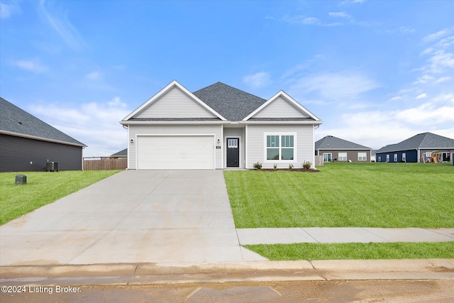 view of front of home with a front yard, central AC, and a garage