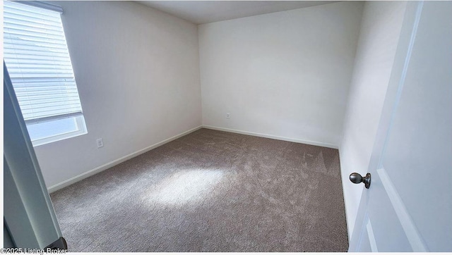 spare room featuring carpet flooring