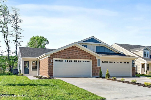 212 Harvest Moon Ct Unit 217A, Shepherdsville, KY 40165 - view of front of property with a garage, driveway, board and batten siding, and a front lawn