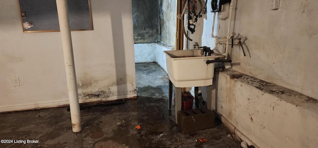 utility room featuring sink