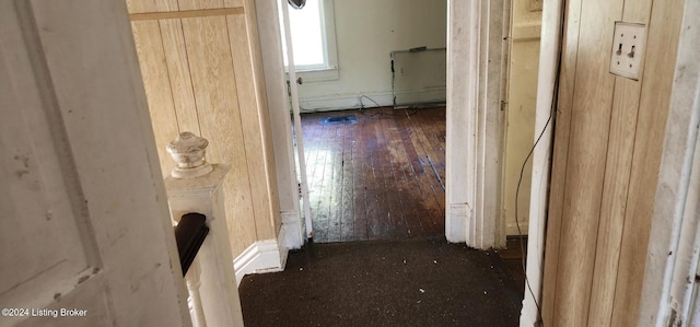 hallway featuring dark hardwood / wood-style floors