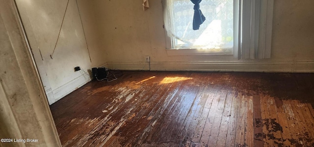 interior space with dark hardwood / wood-style flooring